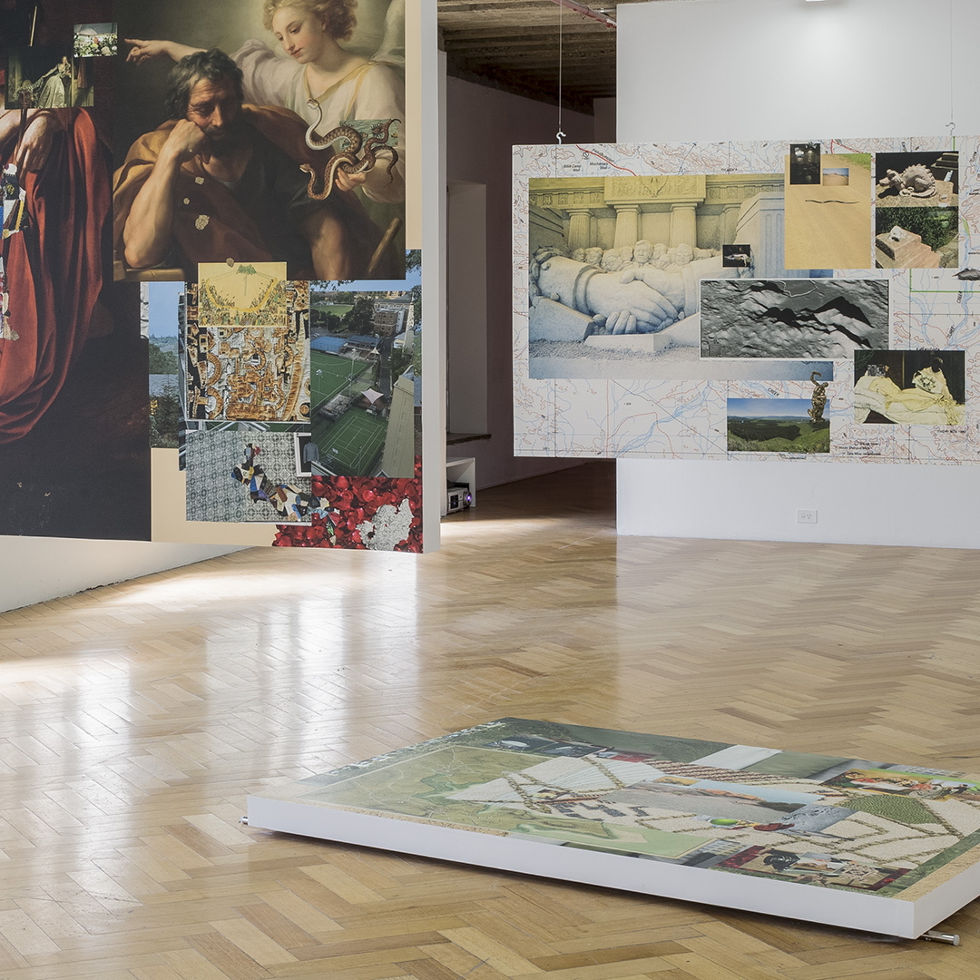 Photo of collage artworks in a gallery