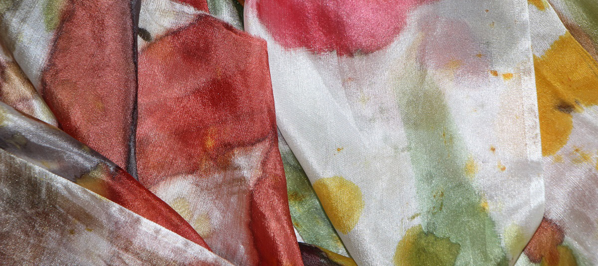 Image of fabric with different colours painted on