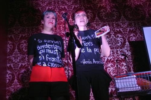 Two female performance artists on stage