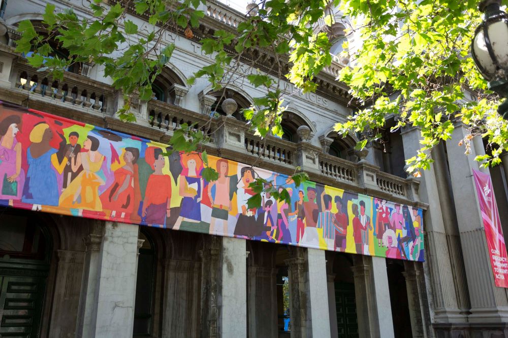 Colourful banners across the facade of Collingwood Town Hall