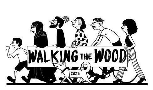 A black and white image of a group of people walking with a banner that reads 'Walking the Wood' 